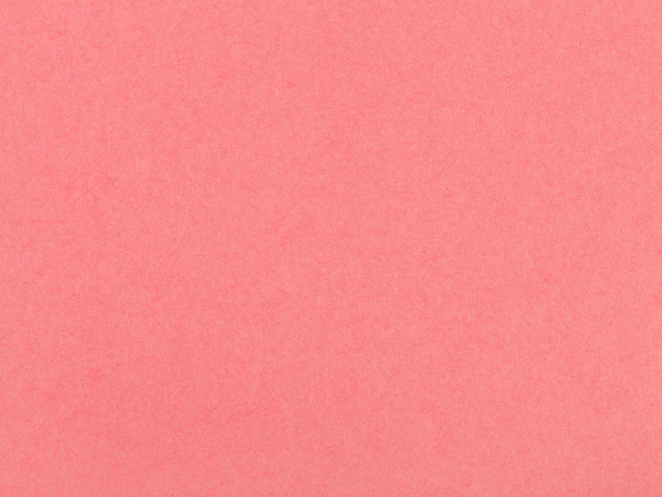 background from sheet of coral colored pastel paper - Photo, Image