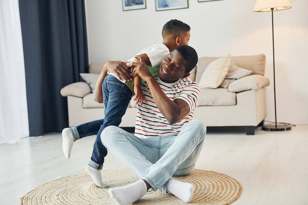 Happy family. African american father with his young son at home. - Foto, imagen