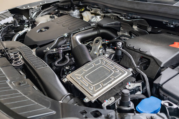 modern car engine under hood close up detail - Foto, Imagen