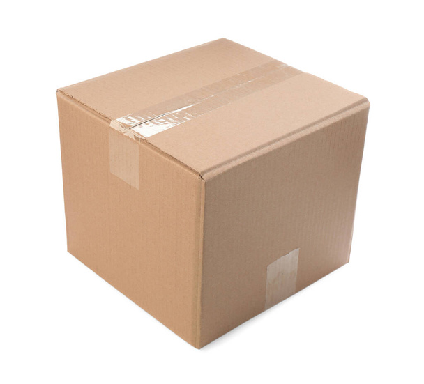 One closed cardboard box on white background - Foto, imagen