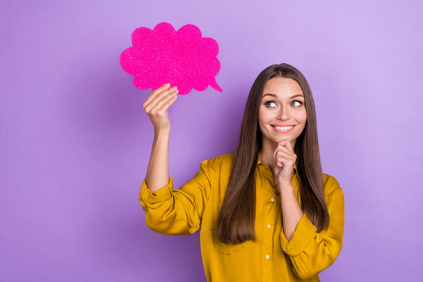 Photo of smart millennial lady hold look cloud wear yellow shirt isolated on purple color background. - Фото, зображення