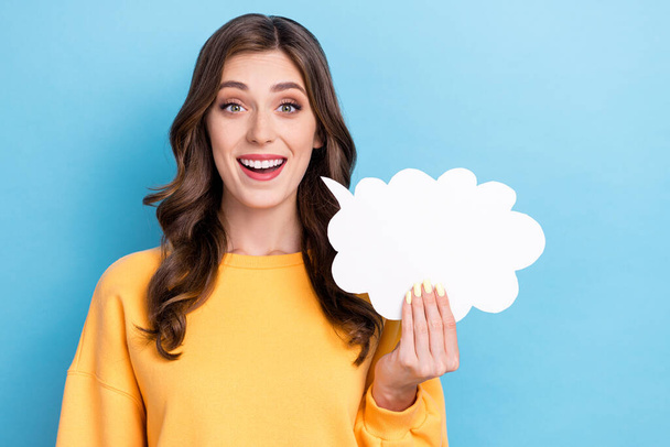 Closeup photo of young funny excited pretty gorgeous woman hold paper cloud information good deal shopping offer isolated on blue color background. - Foto, Imagem