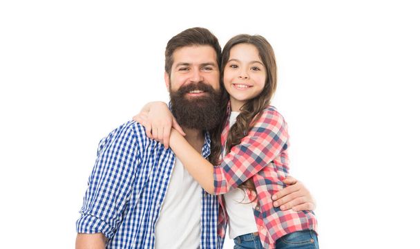 Taking care of their hair. Father and daughter in hair salon. Little girl with long brunette hair hugging bearded man. Hipster with beard and mustache hair and adorable small child. - 写真・画像
