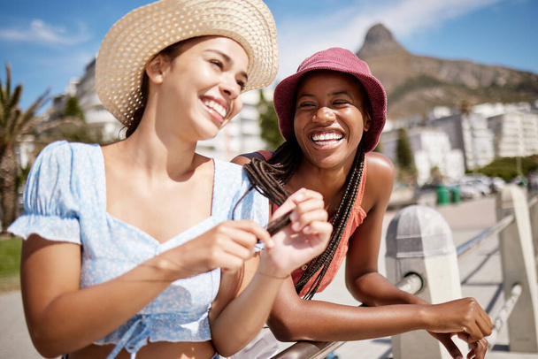 Laughing, phone or fashion women bonding on summer holiday in South Africa city travel location. Smile, happy or comic friends, students or tourist with trend, style clothes or social media 5g mobile. - Photo, image