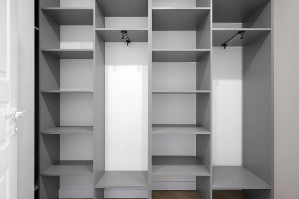Open wardrobe with shelves in the room - Foto, immagini
