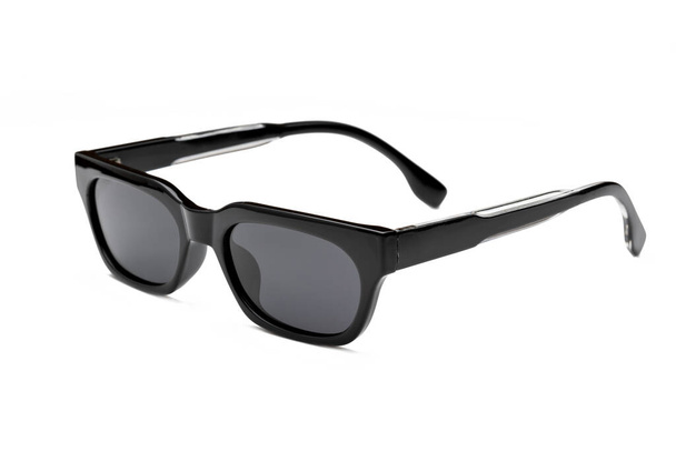 Side view photo of black colored polarized sunglasses for ecommerce isolated on white background - Valokuva, kuva