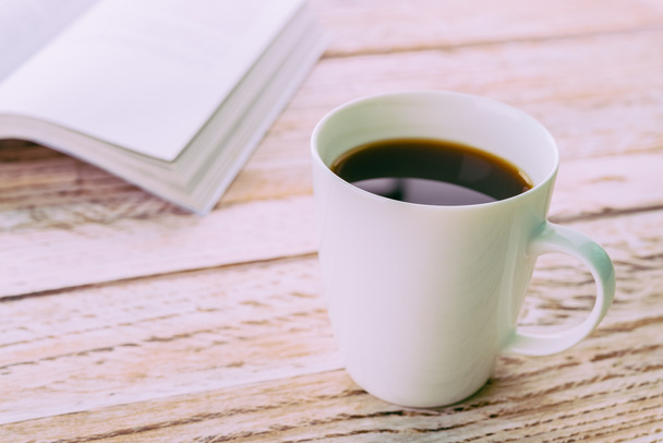 Planificador y taza de café
 - Foto, Imagen