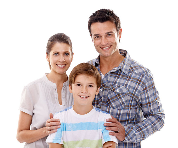 Hes a flourishing young man. Studio portrait of a mother and father standing with their son - Photo, Image