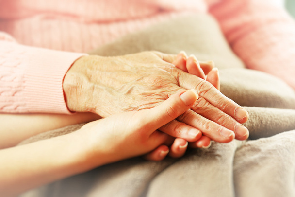 Helping hands, care for the elderly concept - Φωτογραφία, εικόνα
