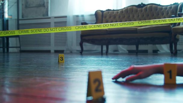 Closeup of a Crime Scene in a Deceased Persons Home. Dead man, Police Line, Clues and Evidence. Concept of Serial Killer and Detective Investigation. - Zdjęcie, obraz