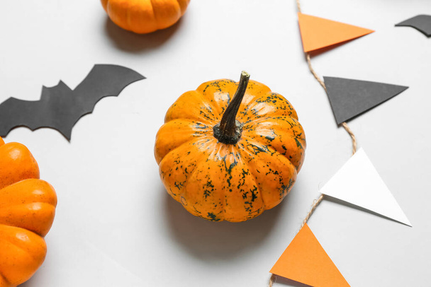 Pumpkin and Halloween decor on white background - Φωτογραφία, εικόνα