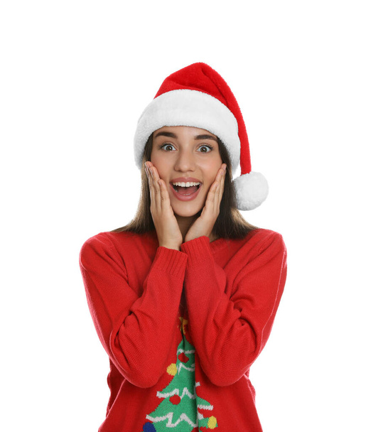 Happy woman in Santa hat on white background. Christmas countdown - Фото, изображение
