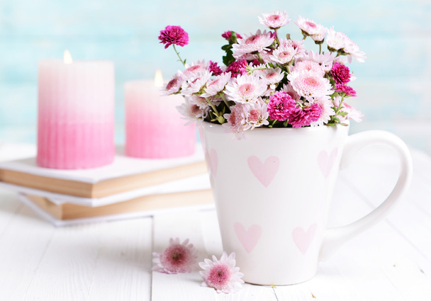 Beautiful flowers in cup - Foto, imagen
