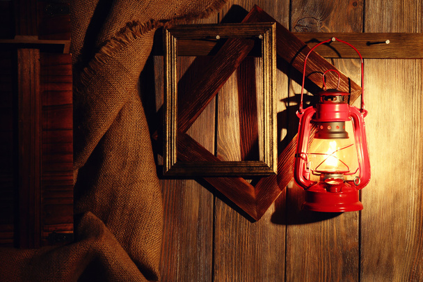 Lantern hanging on hook - Фото, зображення