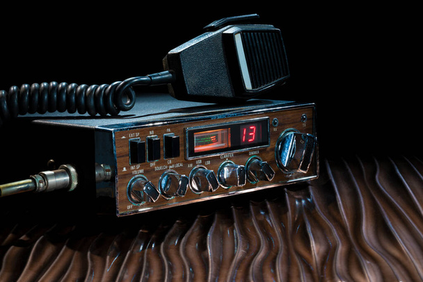 Sideband CB radio set to channel 13 on a wavy bronze surface - Foto, Bild