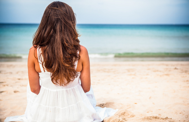 Girl in bikini on the background of the sea - Photo, Image