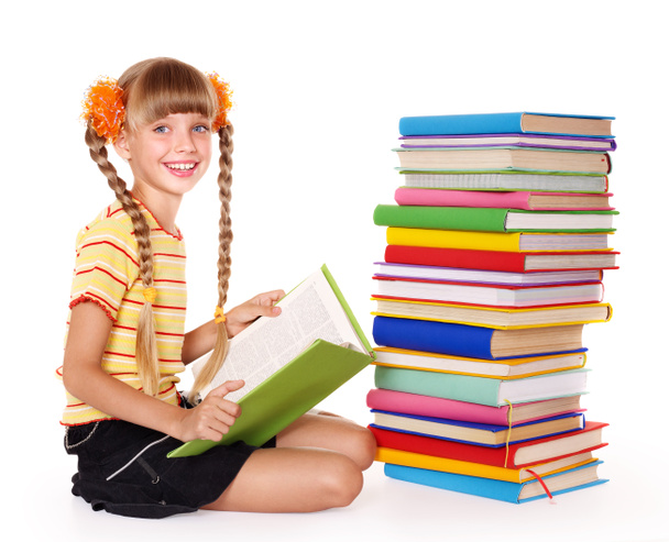Школярка читає купу книг
. - Фото, зображення