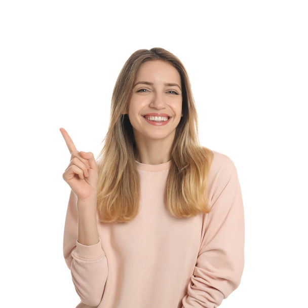 Woman showing number one with her hand on white background - Fotoğraf, Görsel