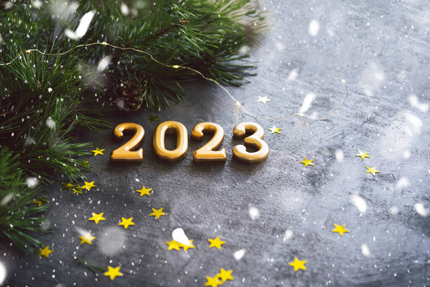 Happy New Years 2023. Christmas background with cone tree and Christmas decorations. Christmas holiday celebration. New Year concept. - Photo, Image