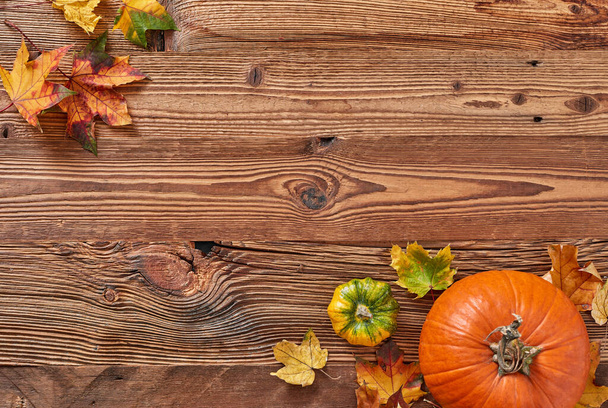 Pumpkins on wooden background - Photo, image