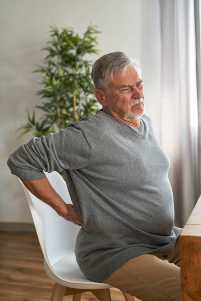 Senior caucasian man with huge pain of back - Photo, Image