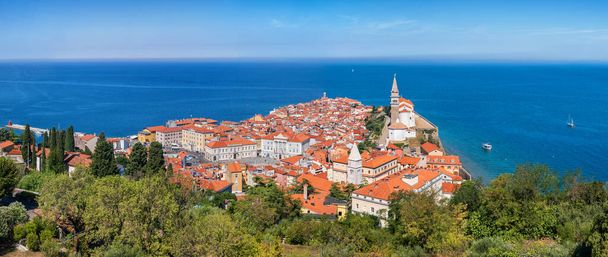 Town of Piran panorama in Slovenia. Picturesque old town on the Adriatic Sea coast in Slovenian Istria region. - Fotoğraf, Görsel