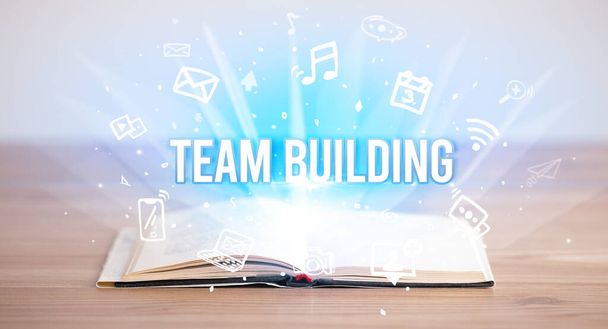 Opeen book with TEAM BUILDING inscription, business concept - Фото, изображение