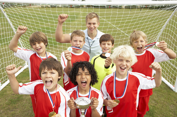 Winning junior soccer team - Foto, afbeelding