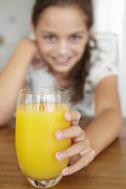 Girl with orange juice - Foto, afbeelding