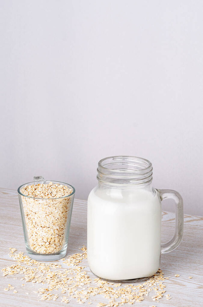 Vegan nondairy home made oat milk. Vertical photography - Photo, Image