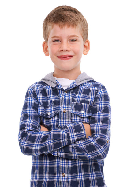 Hes gonna grow big. Studio shot of a casually dressed young boy isolated on white - Foto, afbeelding