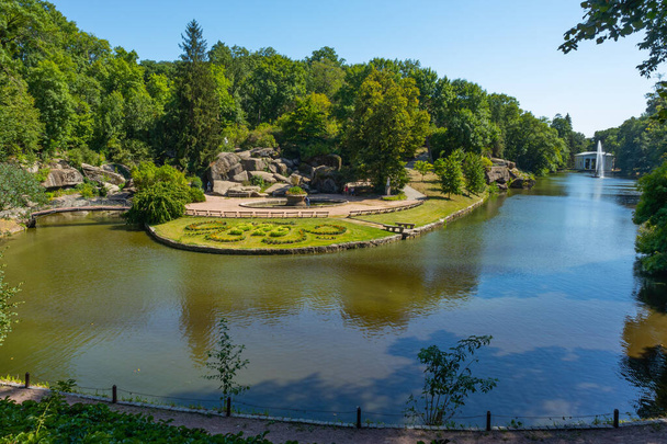 Natural park Sofiyivka in Uman city in summer sunny day. Lake and landscaping - Photo, image