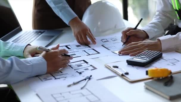Architects and engineers are working together to edit the draft house plan that was designed after it was presented to the client and partially revised the design. Interior design and decoration ideas - Footage, Video