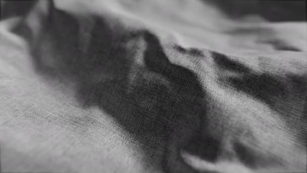 4k Bewegende zwarte grijze stof materiaal textuur golf. Motion ontwerp van golvend doek ruwe grof linnen doek. Abstract 3d renderen animatiepatroon achtergrond voor zakelijke wallpaper presentatie advertenties. - Video