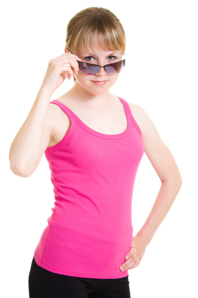 Adolescente en gafas de sol sobre fondo blanco
. - Foto, Imagen