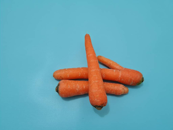 Ingredientes para cocinar o pueden ser jugados, a saber, zanahorias que contienen vitamina A - Foto, Imagen