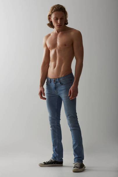 Handsome and stylish. Studio shot of a young man with a bare chest - Foto, Imagen