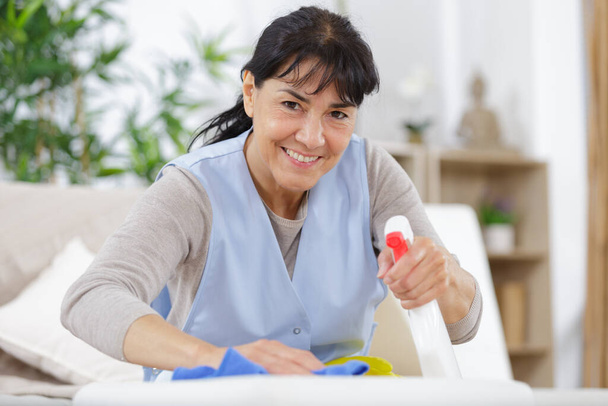 mature woman working as a cleaner - Zdjęcie, obraz