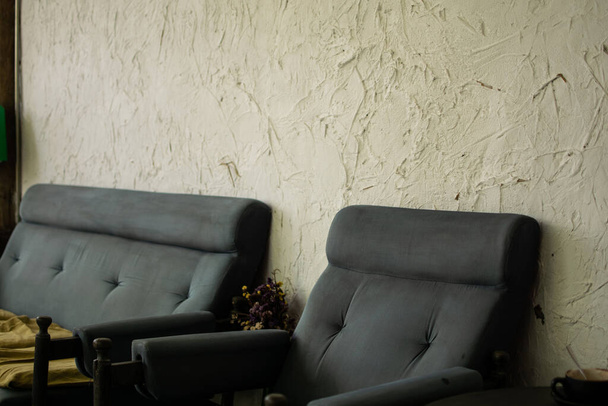 Sofa backdrop of gray and cement. - Фото, изображение