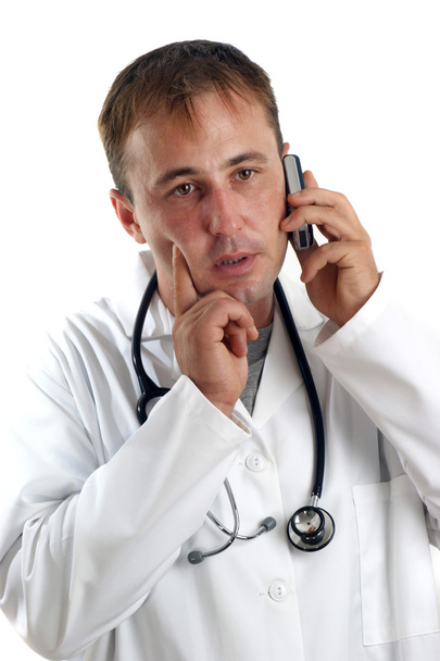 Жест медицинского персонала во время телефонного звонка
 - Фото, изображение