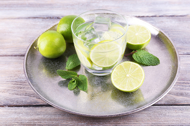 Lemonade in glass on tray - Photo, image