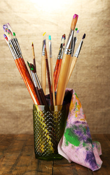 Paint brushes with paints - Foto, afbeelding