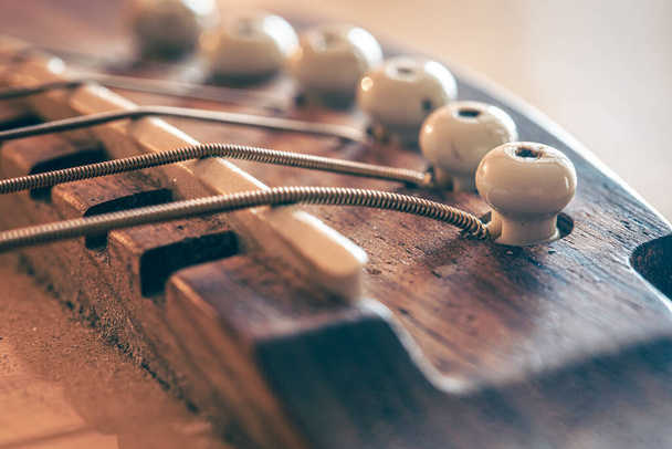 Strings on a classical acoustic guitar, macro shot. - Fotografie, Obrázek
