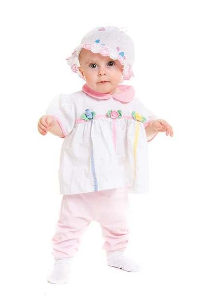 Baby in dress on a white background. - Zdjęcie, obraz