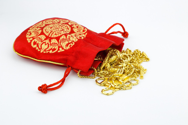 oro e borsa rossa
 - Foto, immagini