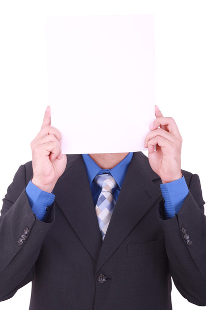 biznesmen z czystym papierze w jego twarz na białym tle - Zdjęcie, obraz