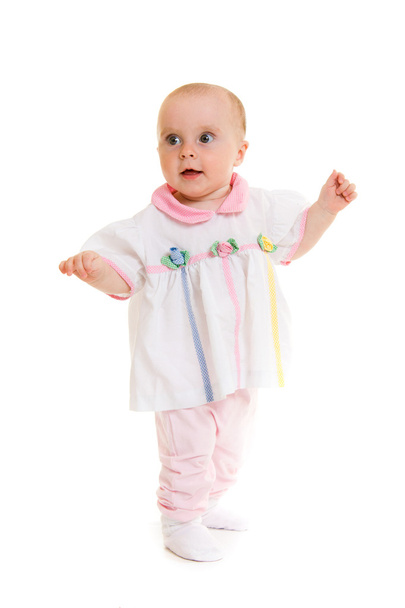 Baby in dress on a white background. - Valokuva, kuva