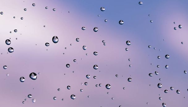 Regendruppels op vensterglas, weerfolder of website achtergrond. - Foto, afbeelding