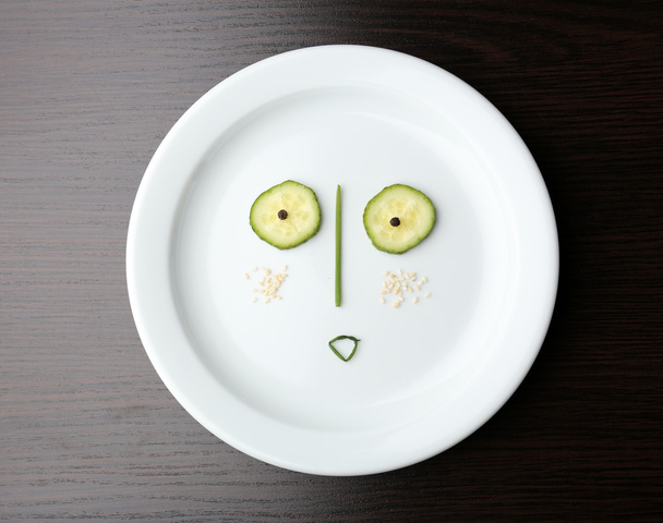 Vegetable face on plate - Foto, Imagen