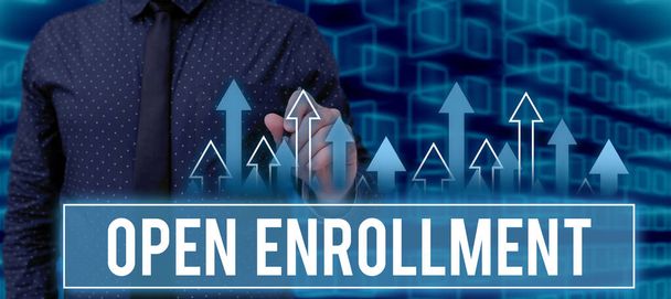 Hand writing sign Open EnrollmentThe yearly period when people can enroll an insurance, Business showcase The yearly period when showing can enroll an insurance - Photo, Image